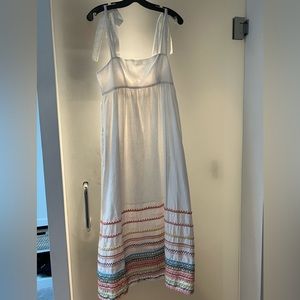 Zimmerman Sun Dress. White with tie detail and rainbow thread detail at hem.